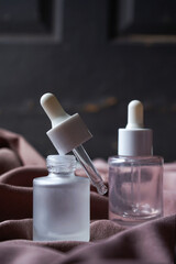 mockup of beauty cosmetic makeup bottle serum dropper product with skincare healthcare concept