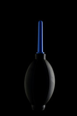 Silhouette of pear for blowing off dust black background.