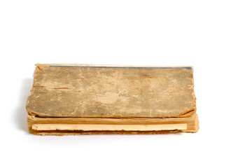 Old battered and yellowed book white background.