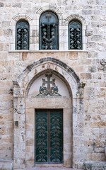 Fototapeta na wymiar An outside side facade photo of the Church of the Holy Sepulchre in Jerusalem