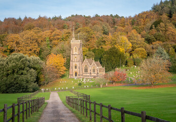 Church of St Etheldreda, St Audries with the backdrop of golden autumn trees