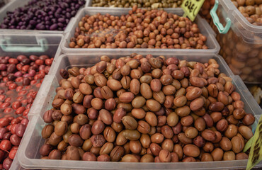 Selective focus on green olives at a Farmers Market.