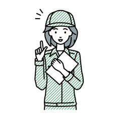 立って書類を手に持って何かひらめいた作業員の女性