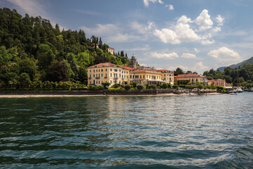 Fototapeta na wymiar Idyllic View of Bellagio Town in Lombardy. Lake Como with Beautiful Architecture in Italy. Buildings and Water in Europe.