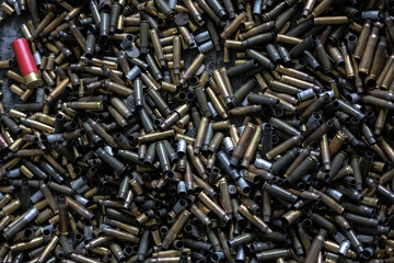on the floor in the shooting range there are casings from fired cartridges of various calibers - from pistols, assault rifles, carbines, rifles