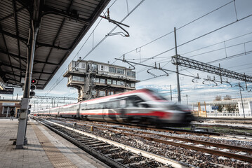 high speed train passing by at the platform. Bologna, Frecciargento.