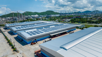 Top view Solar Cell on Warehouse Factory. Solor photo voltaic panels system power or Solar Cell on industrial building roof for producing green ecological electricity. Production of renewable energy. © Yellow Boat