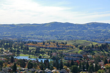 Fototapeta na wymiar Autumn foliage in the San Ramon Valley as seen from a nearby hilltop in Northern California