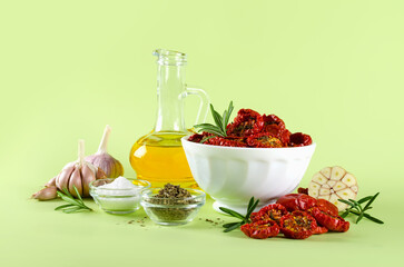 Sun-dried tomatoes, olive oil, garlic, salt, dried basil and fresh rosemary