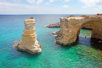 Fototapeta premium Salento, Apulia, astonishing view of stacks in the clean blue sea of Melendugno, Apuliia, Italy