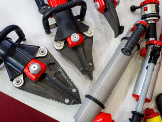 Cutters with hydraulic amplification. Salvage tools. Hydraulic cutters close up. Fragment of...
