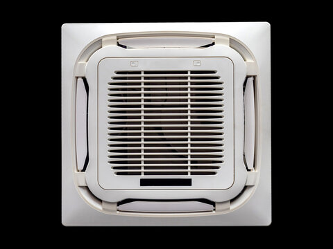 Cassette conditioner. Mesh plate air supply equipment. Fragment of cassette air conditioner. Cassette air conditioner on black. Equipment for oxygen purification. Climate control technology