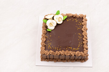 Chocolate homemade cake on the grey marble table