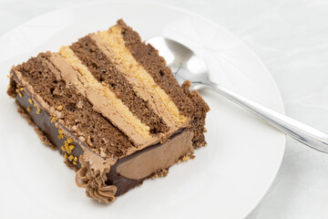 Chocolate homemade cake on the grey marble table