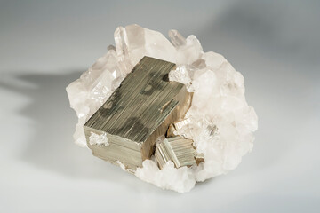 A sample of a natural mineral crystal iron pyrite (sulfide class) fusion on quartz druze untreated crystalline pyrite, fool's gold. Museum Mineral Series. Mineralogical sample