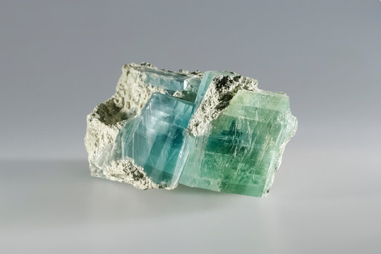 Brucite (hydroxide class) mineral magnesium hydroxide, fused green blue crystals. Museum Mineral Series. Mineralogical sample