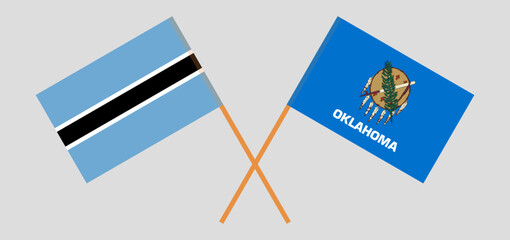 Crossed flags of Botswana and The State of Oklahoma. Official colors. Correct proportion