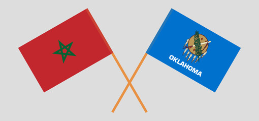 Crossed flags of Morocco and The State of Oklahoma. Official colors. Correct proportion
