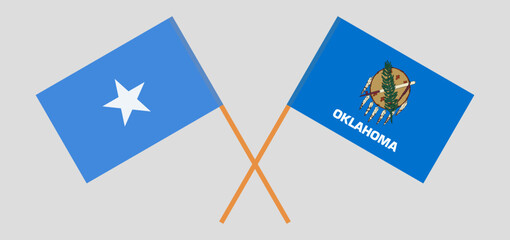 Crossed flags of Somalia and The State of Oklahoma. Official colors. Correct proportion
