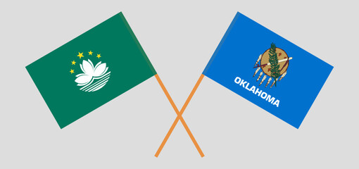 Crossed flags of Macau and The State of Oklahoma. Official colors. Correct proportion