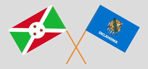 Crossed flags of Burundi and The State of Oklahoma. Official colors. Correct proportion
