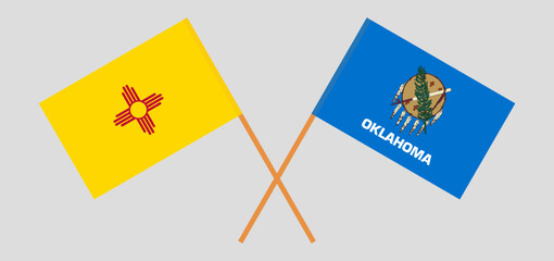 Crossed flags of the State of New Mexico and The State of Oklahoma. Official colors. Correct proportion