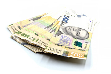 Ukrainian money Hryvnia on a white background close-up