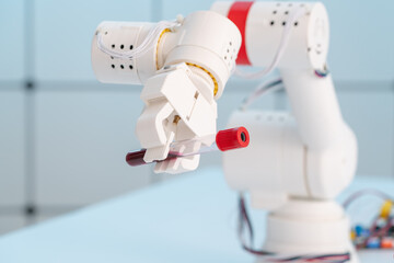 Robot arm with test tube for biological experiments in laboratory