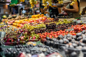 Side view with selective focus to fresh fruit in the greengrocer's market.