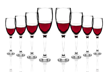 Red liquid wine glass on a white background