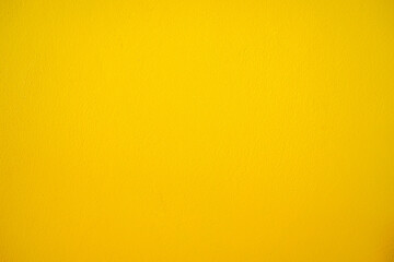 empty yellow concrete wall texture background. Yellow background
