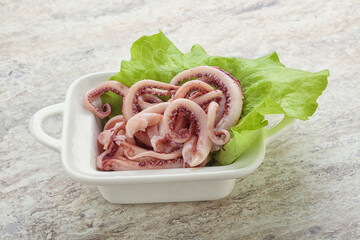 Marinated squid tentacles in the bowl
