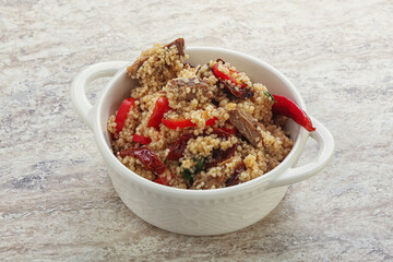Arabic cous cous with meat and tomato