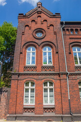 Fototapeta na wymiar Front facade of a historic red brick house in Essen, Germany
