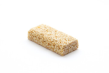 Kozinak from sesame seeds on a white background. Close-up