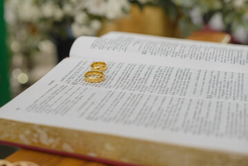Wedding rings on the holy bible in psalm 83