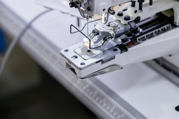 Button on electric sewing machine