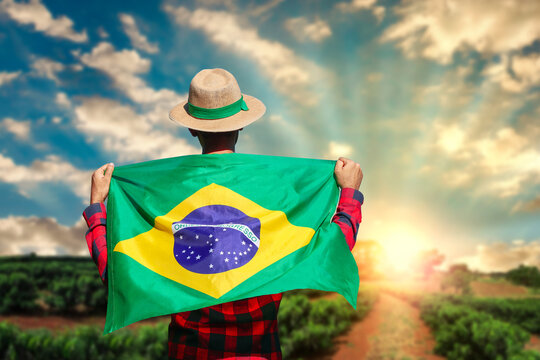 Brazil's Independence Day - Handsome Black Young Man Holding Brazil Flag on Cinematic Background