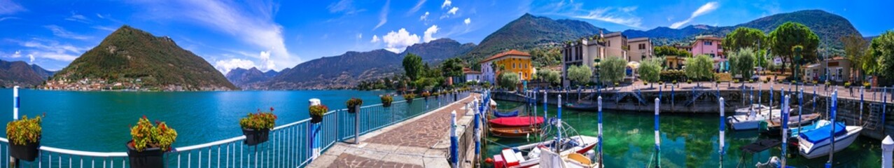 Fototapeta na wymiar italian lakes scenery. Magic Iseo lake . beautiful Monte Isola island and Peschiera Maraglio village. Italy, Brescia province