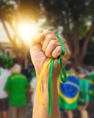 Photo sur Plexiglas Brésil Brazil's Independence Day - Mature Woman with Gray Hair Holding Brazil Flag on Cinematic Background