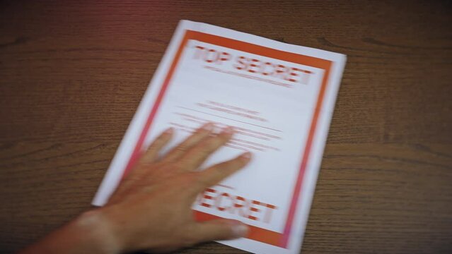 A United States Top Secret document gets taken.  	