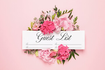 Beautiful flowers and guest list on pink background, flat lay