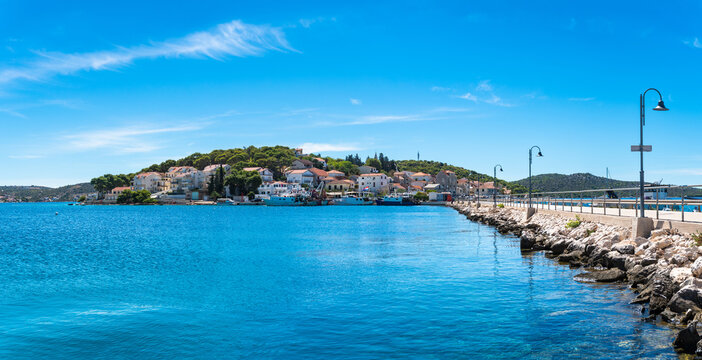 Fototapeta Rogoznica, Dalmatia in Croatia. Bridge that connects the main land with the island.