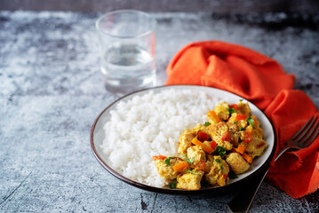 Curry chicken with rice in a plate