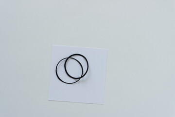 two paper circles or rings isolated on white and blank paper