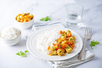 Curry chicken with rice in a plate
