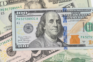 5, 20, 50, 100 dollars banknotes at different angles. Close up of dollars on white background.
