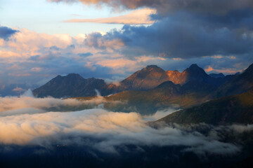 Obraz na płótnie Canvas Summer cloudy landscape of the Berner Oberland Alps in Switzerland, Europe