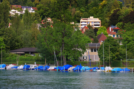Aare river in the city of Thun in summer. Thun is a city and municipality in the administrative district of Thun in the Swiss canton of Bern, located where the Aare river flows out