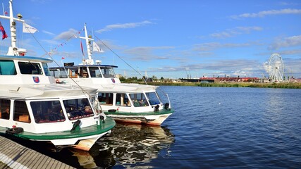 Fototapeta premium Landscape view on the river. Ships at boulevard.